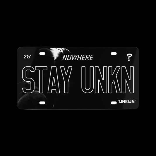 "STAY UNKN" PLATE